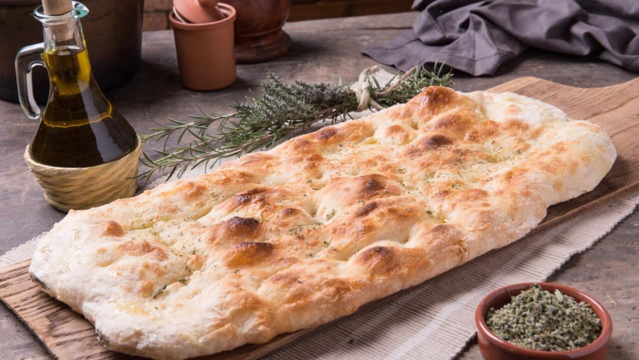 Pizza mit Meeresfrüchten: Original Rezept der italienischen Küche