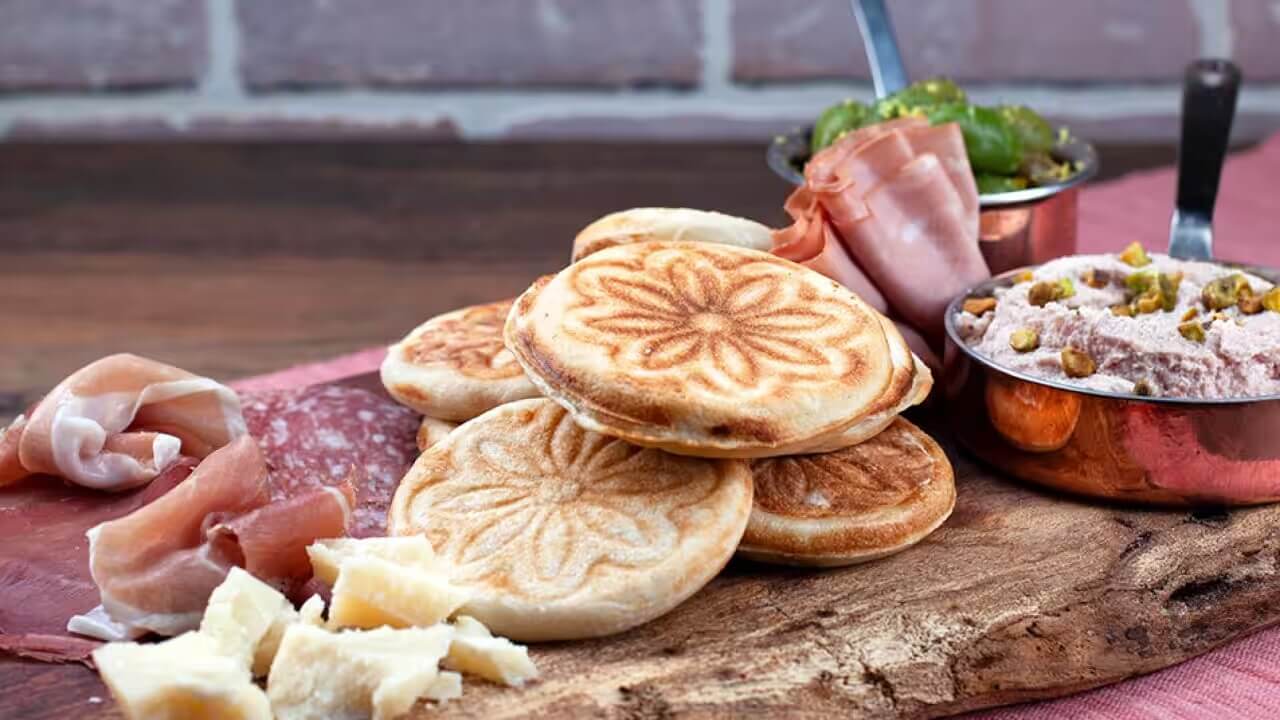 Pizza mit Meeresfrüchten: Original Rezept der italienischen Küche
